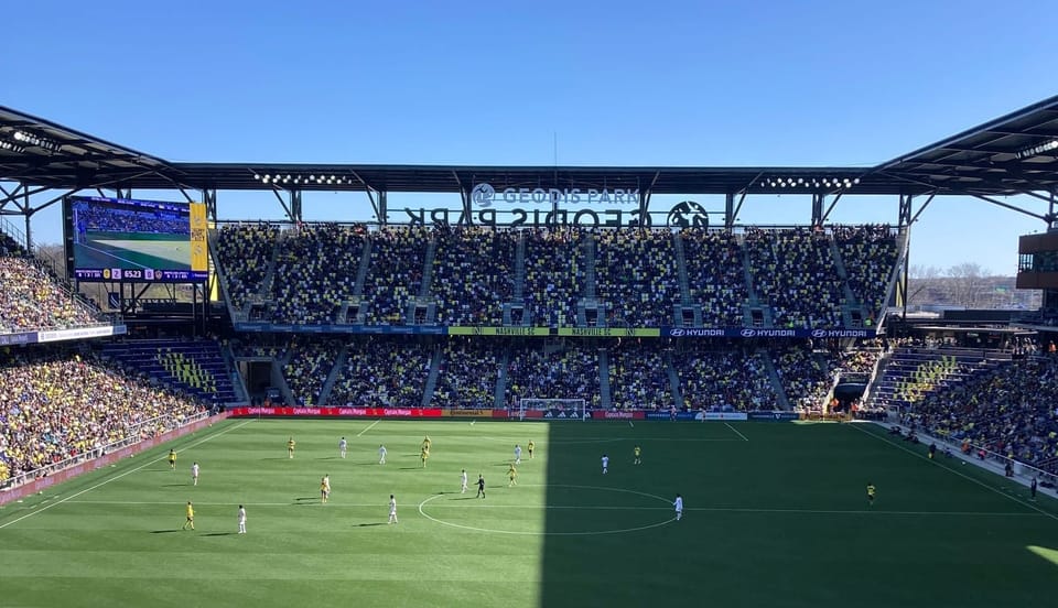 The pitch at Geodis Park split perfectly along the goal line by sun and shade